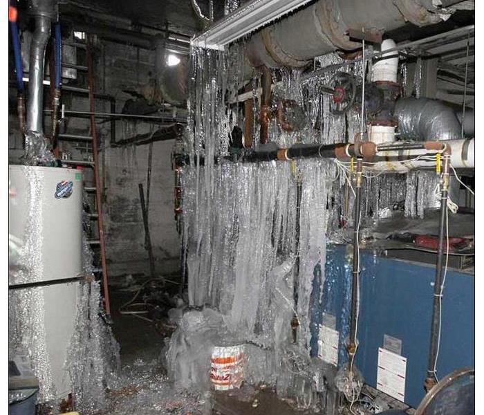 Frozen pipes and water heater in a West Bronx basement.